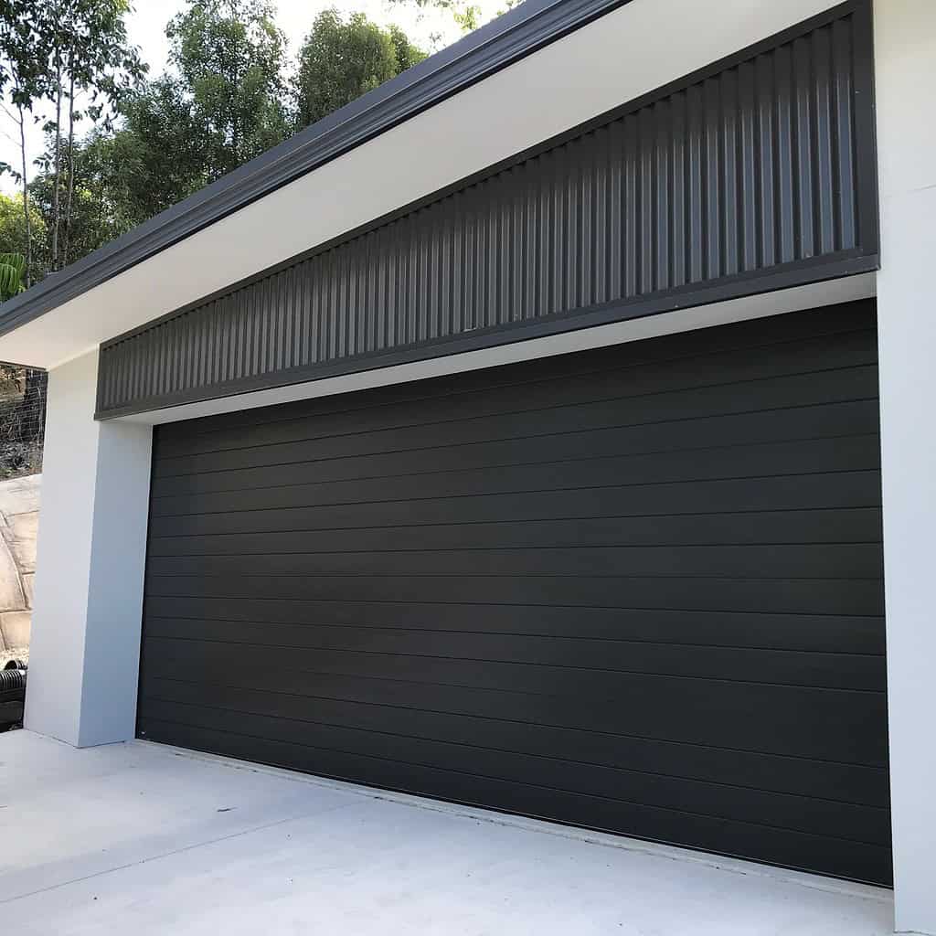 Dark steel roller shutter on a commercial building